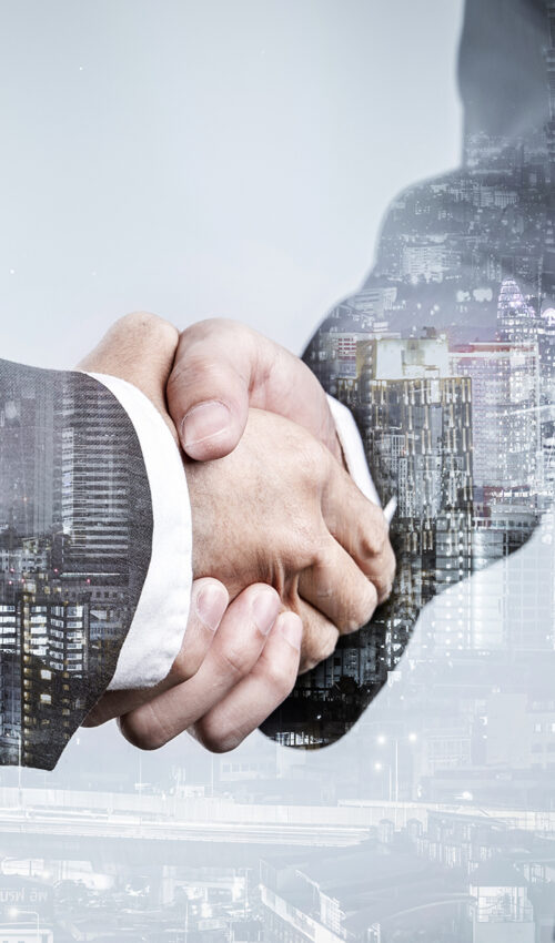 Double exposure of business partnership handshake and modern city , Successful business greeting or agreement after perfect deal